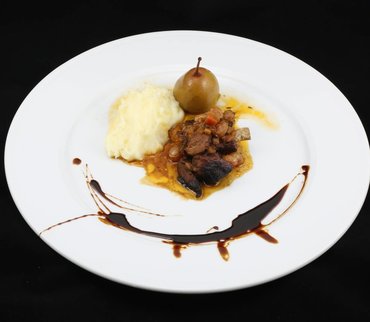 Ragoût d’agneau au raisin et vin cuit